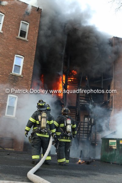 firemen battle massive flames at apartment building fire