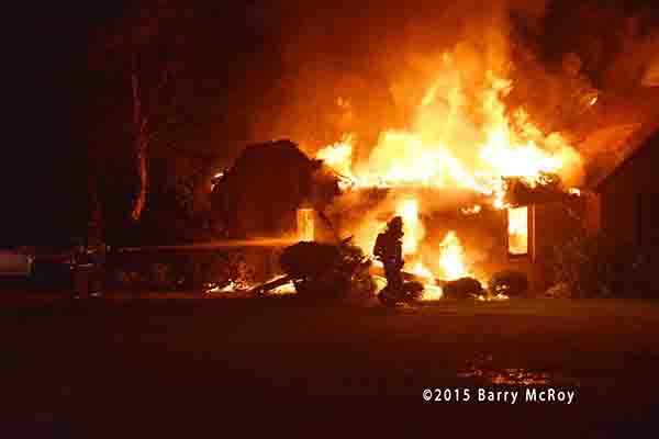 rural house engulfed in fire