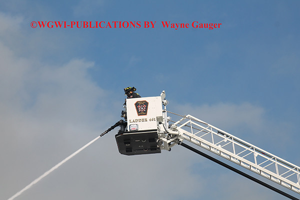 fire department tower ladder at fire scene
