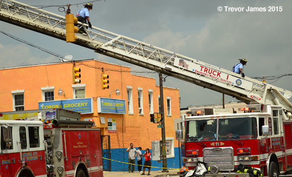 fire department ladder truck at fire scene