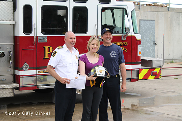 tv news reporter gets fire helmet after training with firefighters