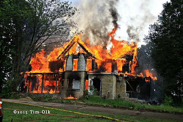 vacant house engulfed in flames for training with fire whirl