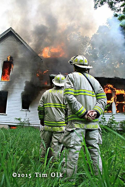 fire chiefs watch house burn