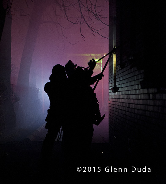silhouette of firemen