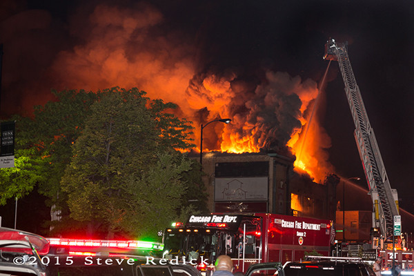 bowling alley on fire at night