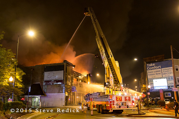 huge commercial building fire at night