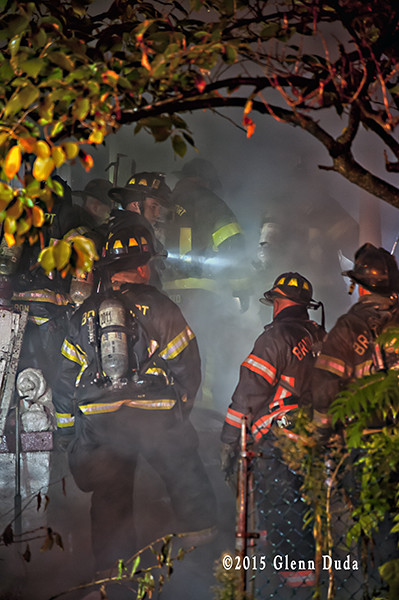 firefighters at night fire scene 