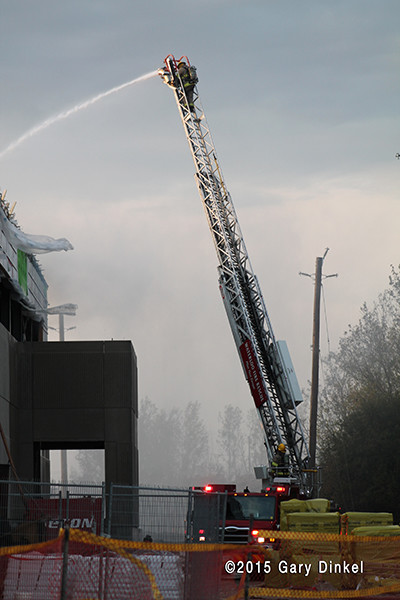 fire on the roof of a construction site