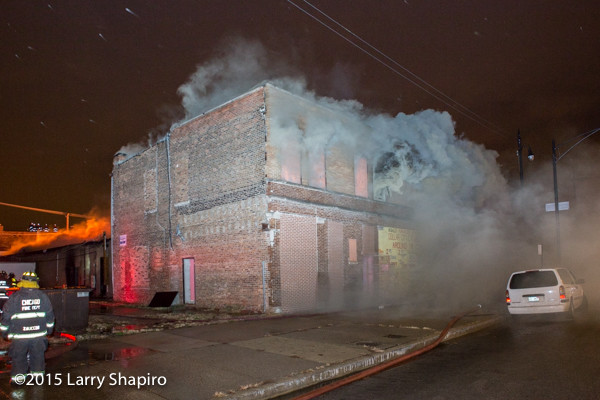 heavy smoke from building fire at night