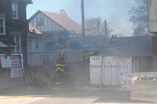 dumpster fire at construction site