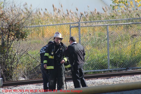 firemen at train tracks