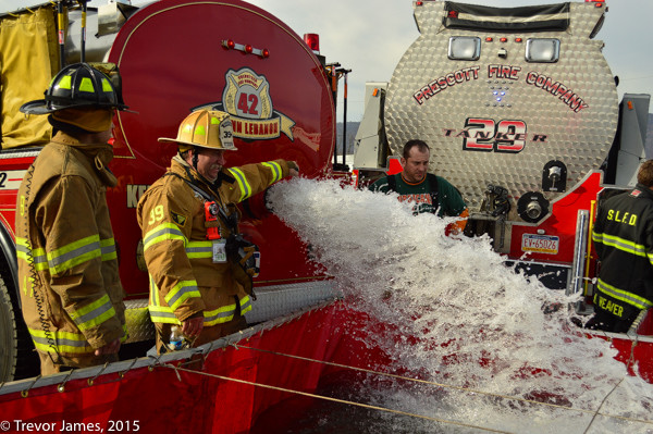 tanker dumps water at fire scene