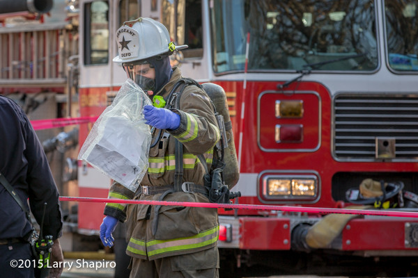firefighter with letter containing a suspicious  powder