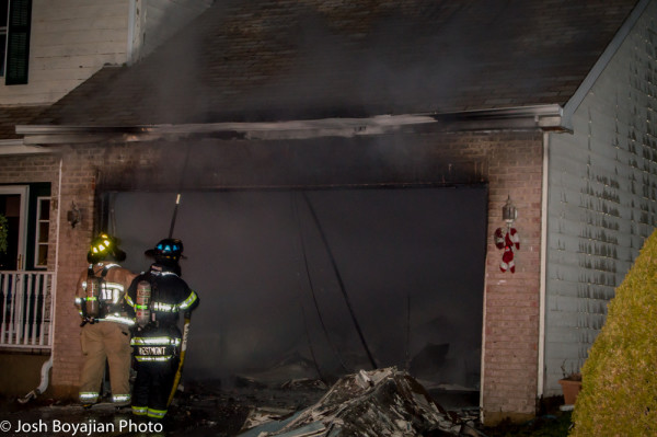 fire in the attached garage of a house