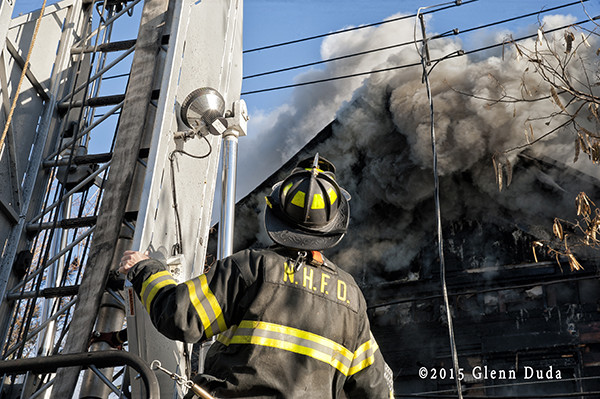 New Haven firefighter at 2-alarm fire