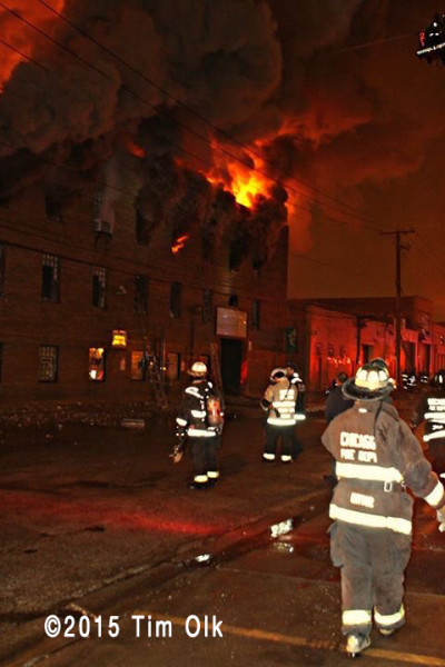 massive building fire at night in CHicago