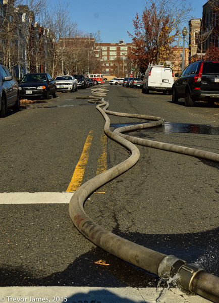 hose on the street at fire scene