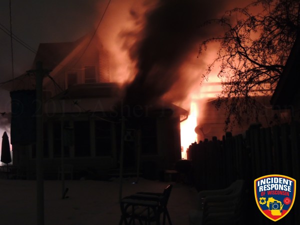flames from house fire at night