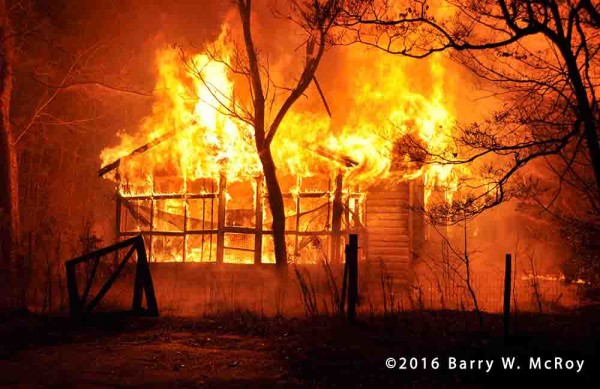 rural house full-engulfed in flames