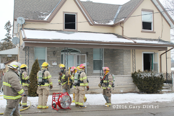 firefighters at a Elmira Ontario house fire scene