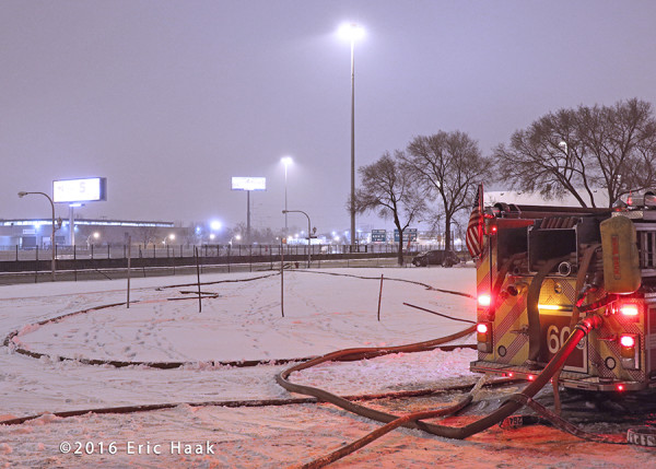 fire hose in the snow at scene