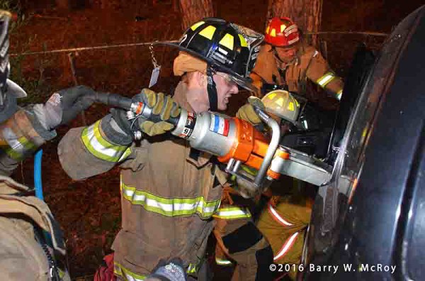 firefighter using Holmato spreader