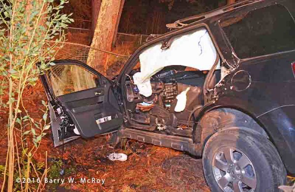 Ford Escape after crash with driver trapped