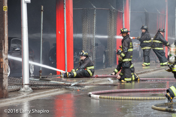 Chicago firefighters battle a commercial fire
