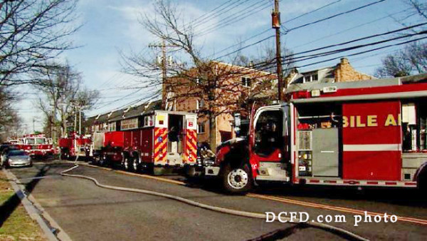 DCFD fire trucks at a fire scene