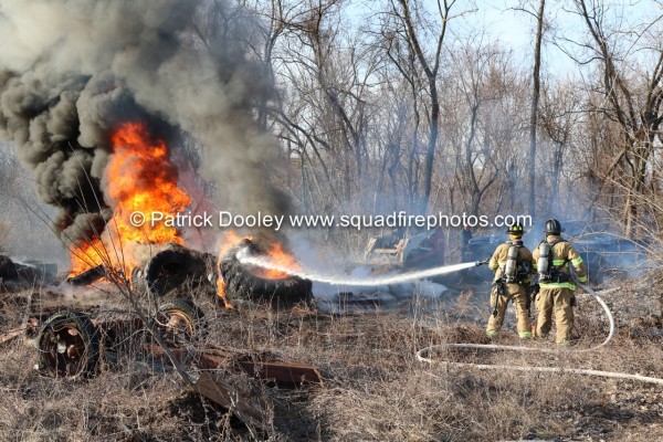 firefighters battle large tire fire