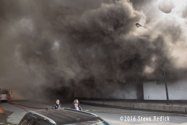 heavy smoke at commercial building fire