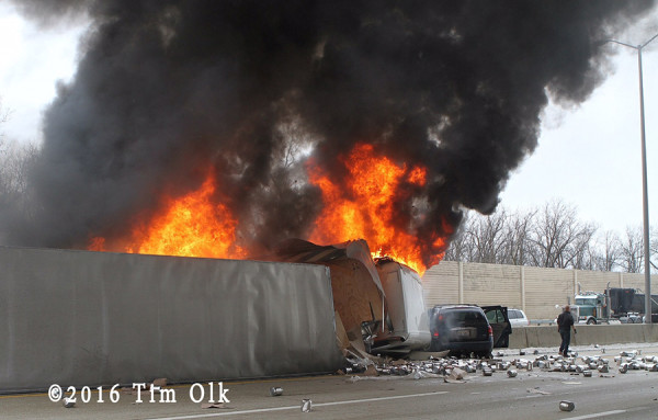 tractor-trailer on fire after rolling over