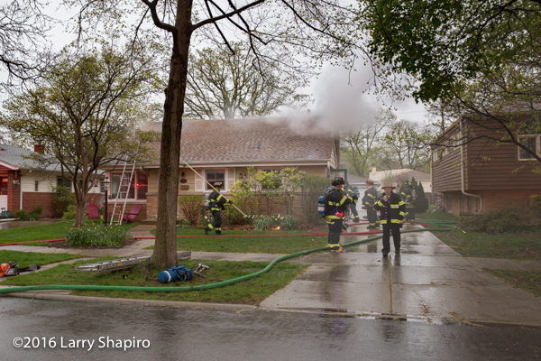 firefighters at Park Ridge house fire