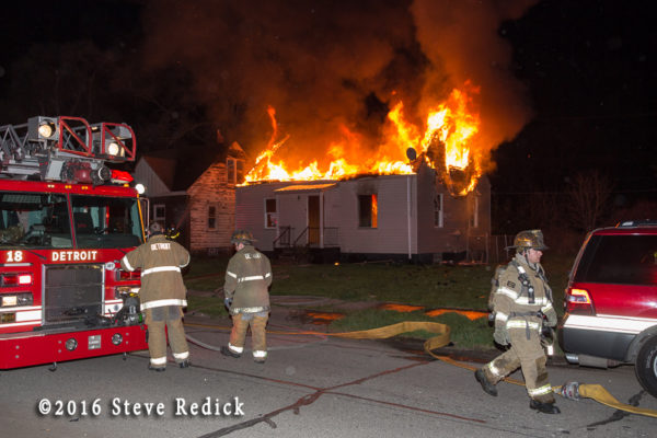 vacant house on fire at night