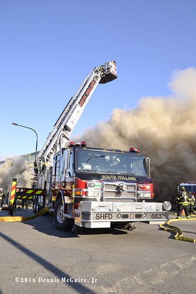 Pierce tower ladder at fire scene
