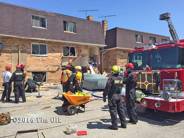 fire department technical rescue crews at a building collapse