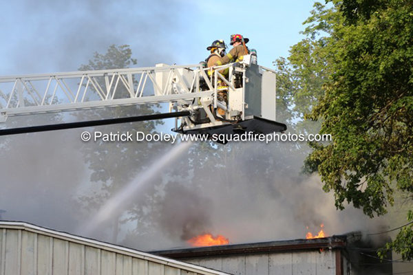 tower ladder elevated master stream at fire
