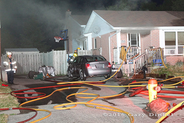 Kitchener Ontario firefighters at a house fire