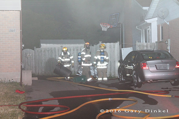 Kitchener Ontario firefighters at a house fire