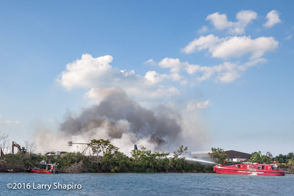 fire boat battles huge fire in Chicago salvage yard