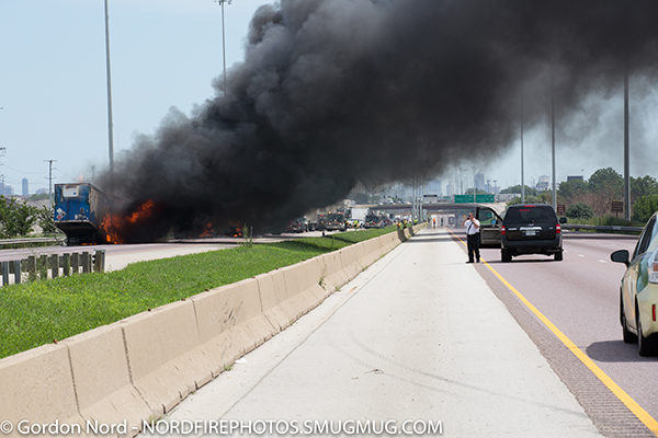 heavy smoke and flames from highway truck crash
