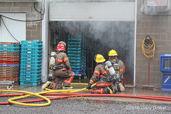 Canadian firefighters battle building fire