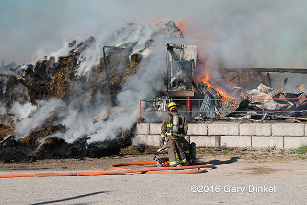 barn and silo destroyed by fire in Canada
