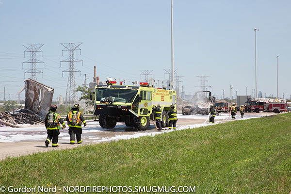 CFD airport crash truck at semi crash on a highway