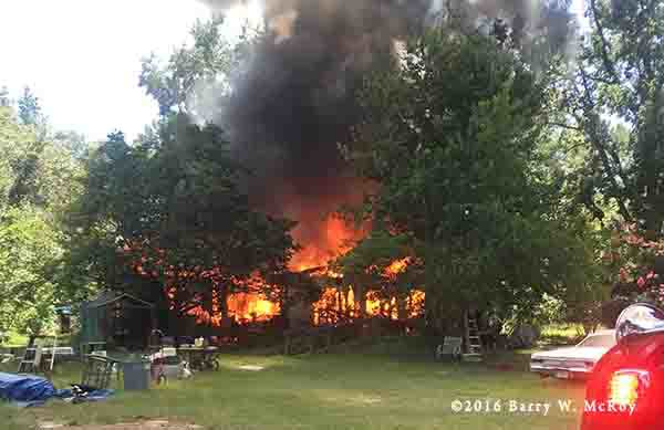 doublewide trailer home on fire