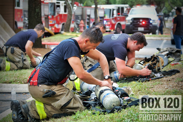 firefighters changing SCBA bottles