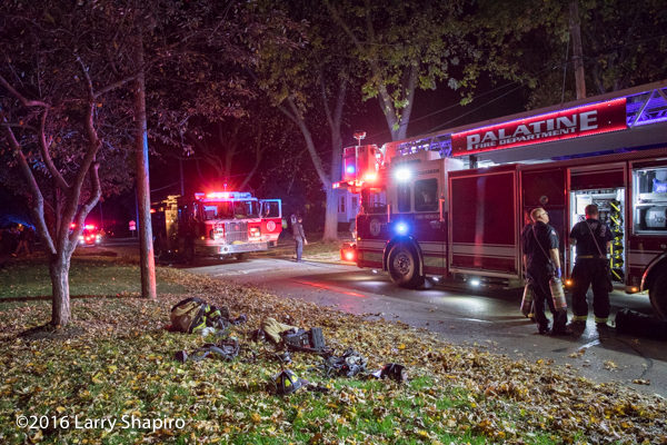 Spartan fire trucks at night fire scene 