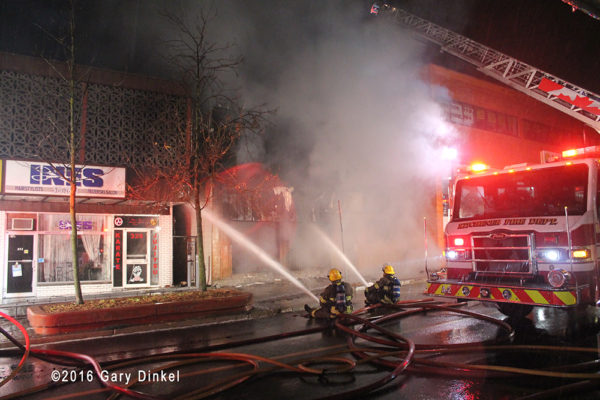 Kitchener firefighters battle a fire at night