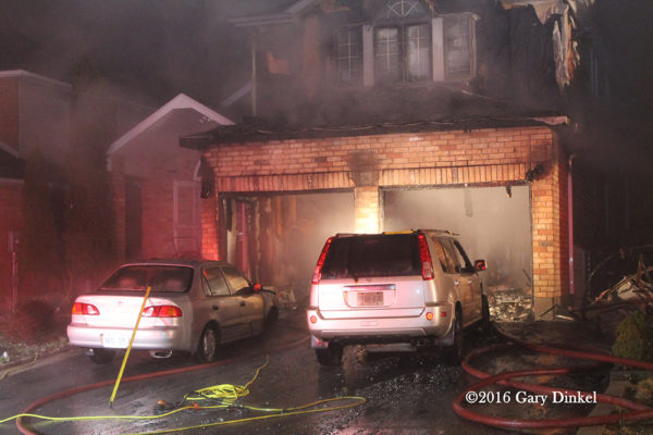 aftermath of garage fire attached to a house