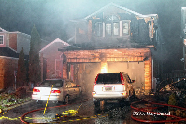 aftermath of garage fire attached to a house